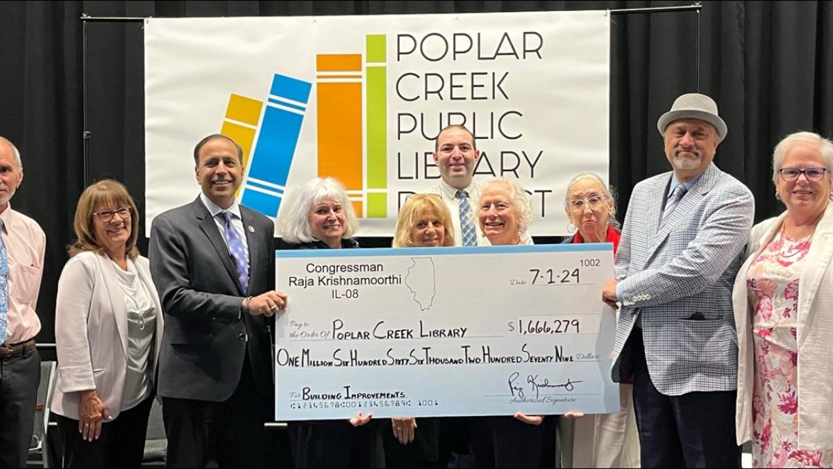 Congressman Krishnamoorthi Presents Check To Poplar Creek