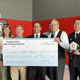 COngressman krishnamoorthi presents check to Mt Prospect